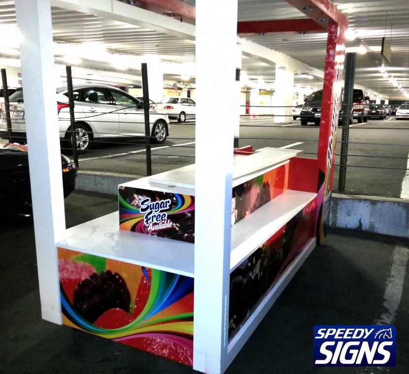 Speedy Signs Kiosk Wrap and Visual Design